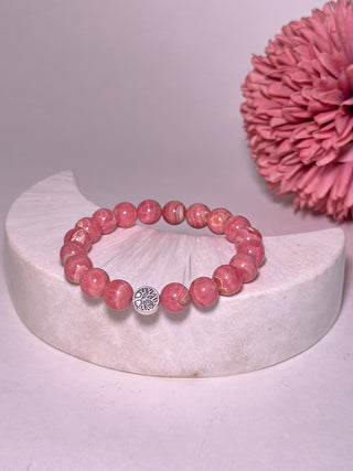 Rhodochrosite is a popular heart-stone choice and ideal for those needing to address troubles from the past.