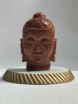 Sparkle of the Universe- Red Gold Stone Buddha face