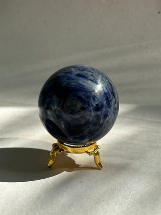 Office Luck Sodalite Sphere - Spheres provide us with an overall feeling of stability, harmony, and unity since their energy is very balancing and the circle resembles the circle of life, and brings in life force energy and wholeness